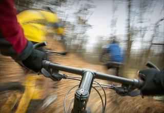 Blurred view of mountain bike in forest