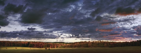 Dramatic sky over rural landscape