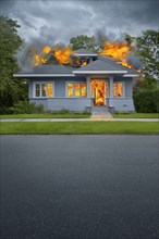 Burning house on suburban street