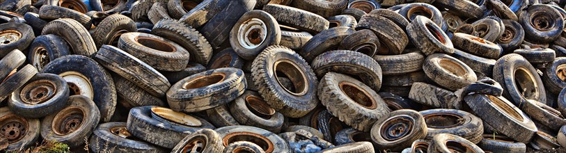 Pile of tires in junkyard