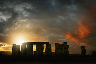 Sun rising over Stonehenge
