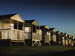 Wooden beach huts in a row