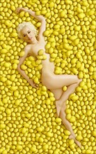 Caucasian woman laying in pile of lemons