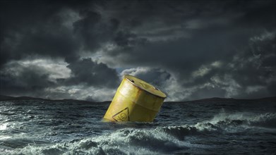 Oil barrel floating in stormy sea