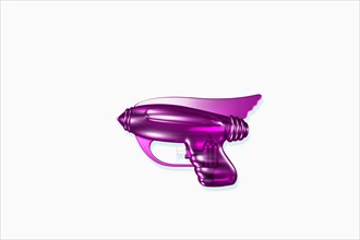 Close up of futuristic purple laser gun