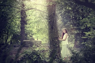 Caucasian girl exploring forest