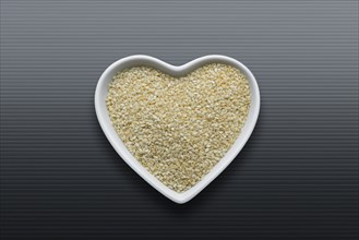 Heart-shaped bowls of heart-healthy seeds