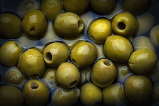 Green olives in liquid