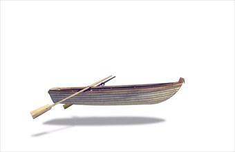 Rowboat and oars floating in white background