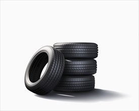 Pile of tires on white background
