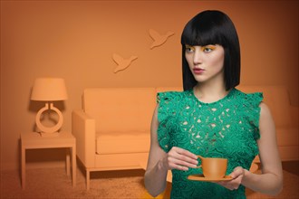 Caucasian woman in orange old-fashioned livingroom drinking coffee