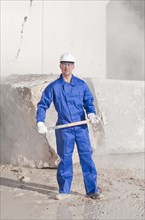 worker with sledgehammer