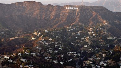 Aerial view of Hollywood sign over Los Angeles cityscape