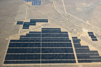 Aerial view of solar farm in remote landscape