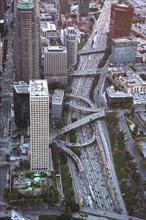 Aerial view of highway in Los Angeles cityscape