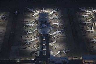 Aerial view of airplanes parked in airport gate