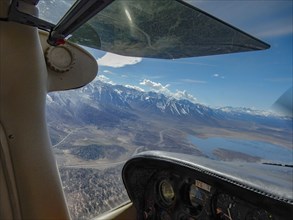 View of lake and mountains from cockpit