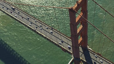 Aerial view of cars driving on bridge