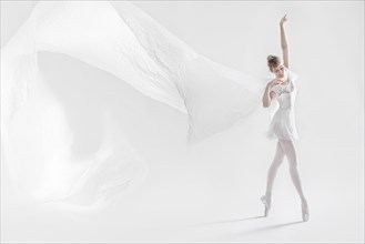 Caucasian ballet dancer dancing on pointe
