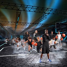 Composite image of athletes playing basketball on court