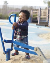 African American baby playing in park