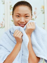 Woman wrapped in towel