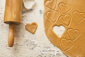 Heart shape cut from cookie dough
