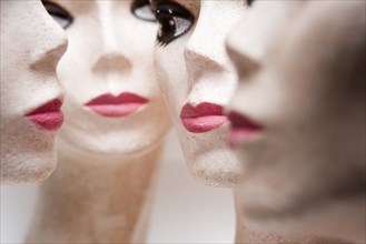 Four female mannequin heads