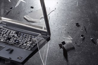 Shards from shattering laptop
