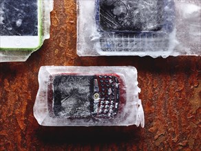 Cell phones frozen in ice