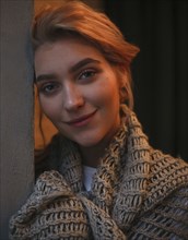 Portrait of smiling Caucasian woman wearing scarf