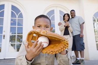 African American boy with baseball and glove