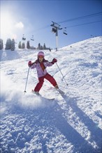 Asian girl skiing