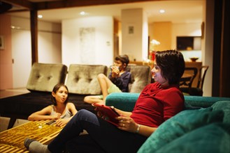 Family relaxing together in living room
