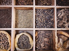 Overhead view of dried spices for sale in market