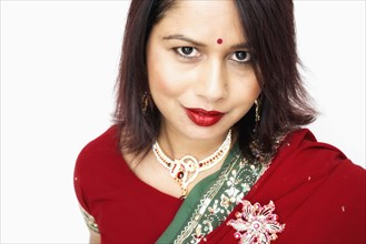 Mixed race woman wearing traditional sari