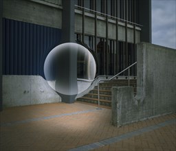 Sphere floating over city stairs