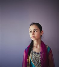 Mixed race girl wearing traditional Punjabi clothing