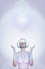 Woman using virtual reality helmet under pixelated sphere