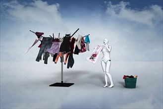 Woman robot hanging laundry on clothesline