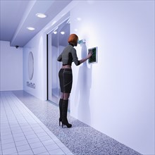 Woman using biometric scanners in futuristic corridor
