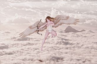 Cupid Angel shooting bow and arrow in clouds