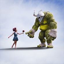 Girl giving flower to giant ogre