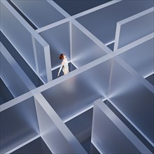 Woman looking up in maze
