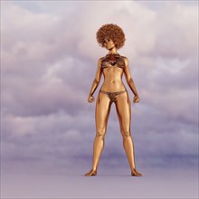 Golden woman with afro wearing bikini