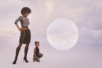 Surprised mother and daughter watching floating sphere