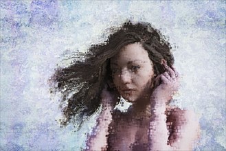 Wind blowing hair of pixelated woman