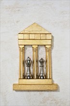 Golden model of king and queen chess pieces