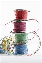Stacks of spools of multicolor thread