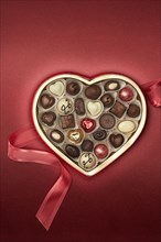 Close up of heart-shaped box of chocolates